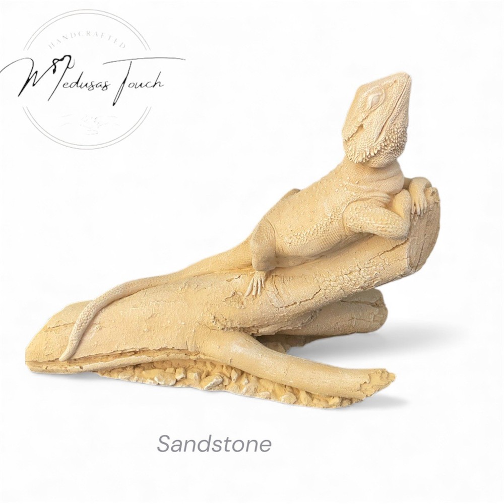 bearded dragon on log life sized concrete statue
