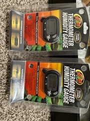 reptile care lot includes hide and food and water dishes