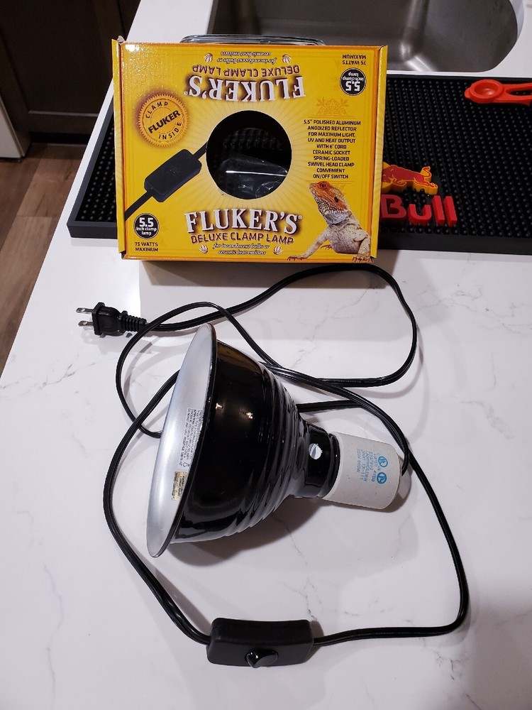 Flunker’s heat lamp clamp on fixture with 60w ceramic bulb