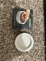 reptile care lot includes hide and food and water dishes