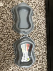reptile care lot includes hide and food and water dishes