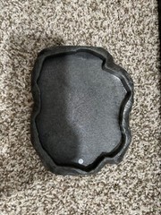 reptile care lot includes hide and food and water dishes